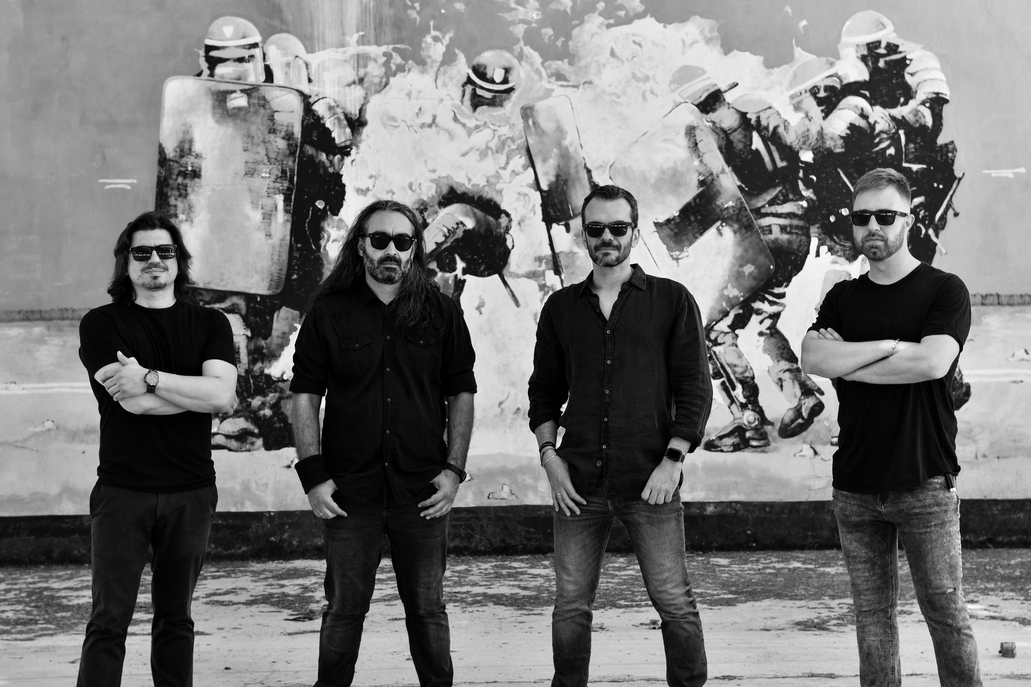 Greek band Perfect Mess posing for a photoshoot. Perfect Mess recently released their new album, Breathe